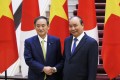 菅首相とフック首相が会談、12件の協力文書に署名